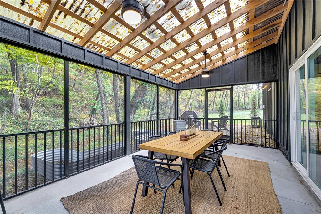 The Barn pergola patio with string lights